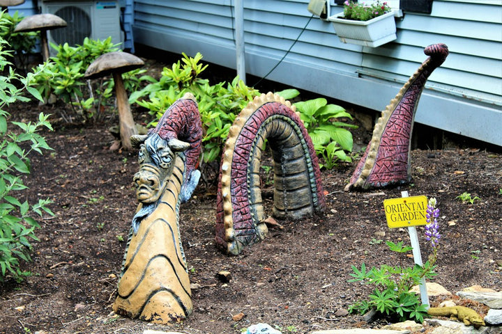 How to Style Wooden Garden Figures in a Small Front Yard Without Making It Feel Cluttered