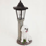 Bits and Pieces - Solar Dog Lantern-Solar Powered Garden Lantern - Resin Dog Sculpture with LED Light (Bichon) - 13.5" Tall