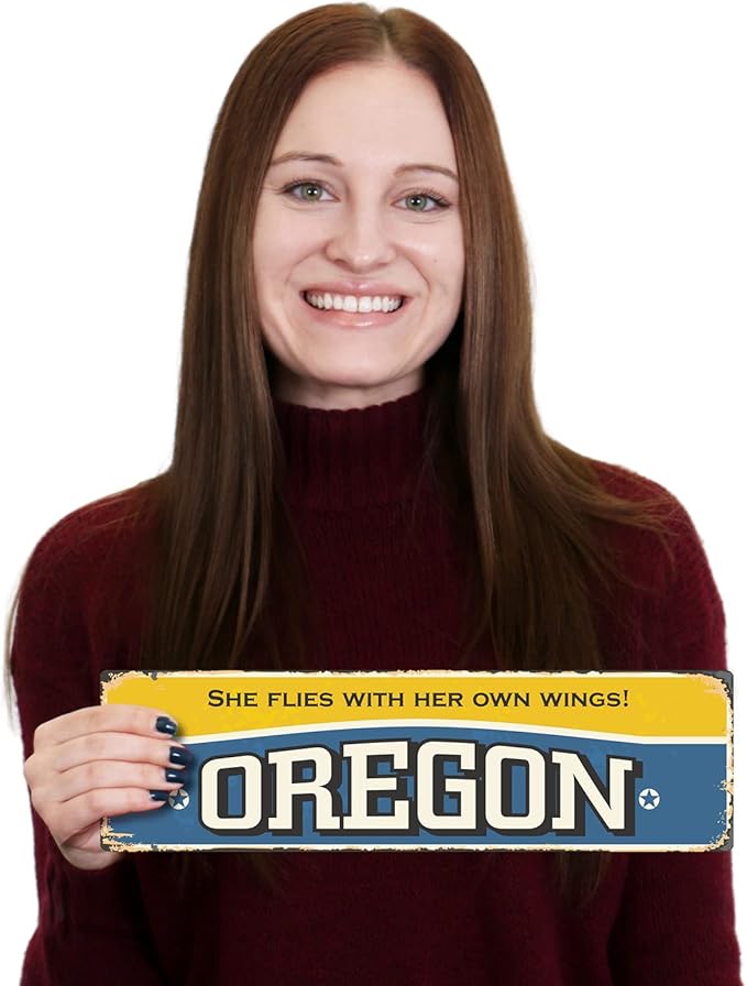 SmartSign 4 x 14 inch Oregon State Vintage Metal Sign “She Flies With Her Own Wings”, 40 mil Rustproof Aluminum with Clear Overcoat, Retro Wall Décor, Multicolor, Made in USA