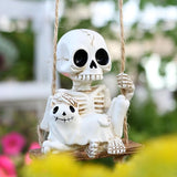 Swing Skeleton Holding Ghost Cat Garden Statue Outdoor Halloween Decor, 3.15 Inch Cute Skull Figurine Resin Sculpture Funny Tree Hanging Ornaments for Patio Lawn Yard
