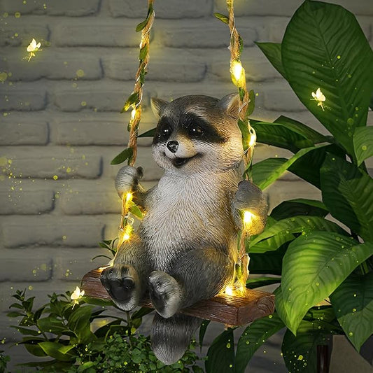 Thyle Solar Light Outdoor Raccoon Statues 19" H Hanging Raccoon on Swing with LED Light Resin Waterproof Hanging Animal Figurine with Hook for Yard Garden Wall Decoration Gift
