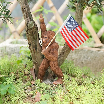 The Bigfoot Statue Holding The National Flag, A 10.4-Inch Resin Statue, Sasquatch Gifts. Bigfoot Decor is Suitable for Outdoor and Indoor Decor. Father's Day