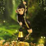 Rossesay Solar Light Outdoor Monkey Statues Black 7.48 Inch Resin Chimpanzee Baby Monkey Climbing on Vine with LED Lantern Waterproof Hanging Figurine with Hook for Yard Garden Wall