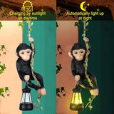 Rossesay Solar Light Outdoor Monkey Statues Black 7.48 Inch Resin Chimpanzee Baby Monkey Climbing on Vine with LED Lantern Waterproof Hanging Figurine with Hook for Yard Garden Wall