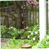SamFansar 42.52 Inch Hanging Rain,Chain Rotating Fretwork Beads with Bell Rain Catcher for Gutters,Metal Drainage Rain Chain Pendant Downspout Tool for Outside, Decorative Your House and Garden Brown