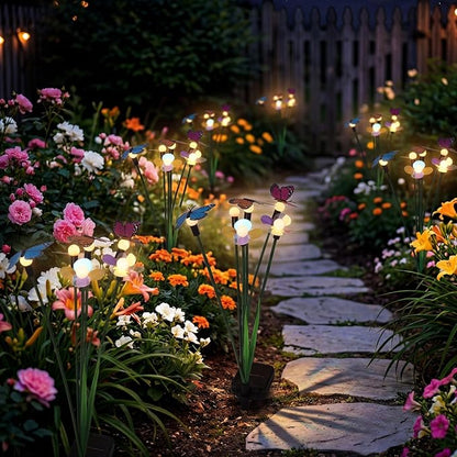 Hoikwo Solar Garden Lights 4 Pack, Swaying Butterfly Flower Stakes Outdoor, Lifelike Butterflies and Flowers with 6 LED Warm Lights, Solar Lights Decor for Yard, Patio, Garden, Pathway