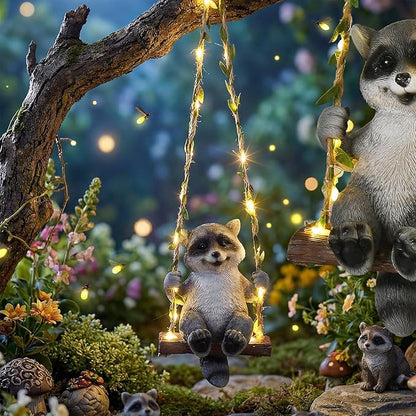 Thyle Solar Light Outdoor Raccoon Statues 19" H Hanging Raccoon on Swing with LED Light Resin Waterproof Hanging Animal Figurine with Hook for Yard Garden Wall Decoration Gift