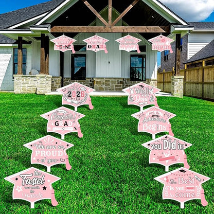 Chunful 12 Pack Graduation Yard Signs Grad Decoration 2026 Happy Graduate Lawn Garden Sign with Stake Congrats Outdoor Plastic Cap Hanging Ornament for Class Pathway Walkway Porch Party(Pink White)