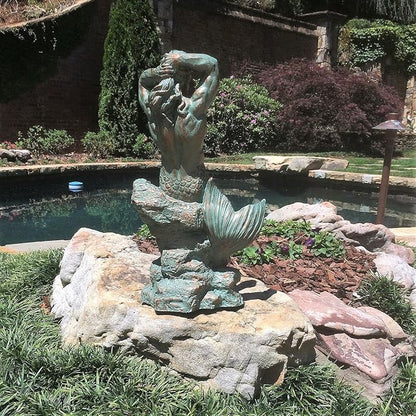 homestyles 21 in. Sexy Triton Merman Male Mermaid on Nautical Rock Bronze Patina Beach and Pool Statue