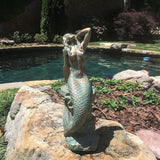 homestyles 16 in. Large Sexy Mermaid Sitting on Coastal Rock Beach Nautical Garden Statue in Bronze Patina Pool Patio Lawn Statue