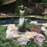 homestyles 21 in. Sexy Triton Merman Male Mermaid on Nautical Rock Bronze Patina Beach and Pool Statue