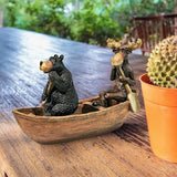 Moose and Black Bear in a Boat Statue