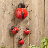 The Lakeside Collection Metal Ladybug Garden Decorations with Red and Black Spots - Set of 4